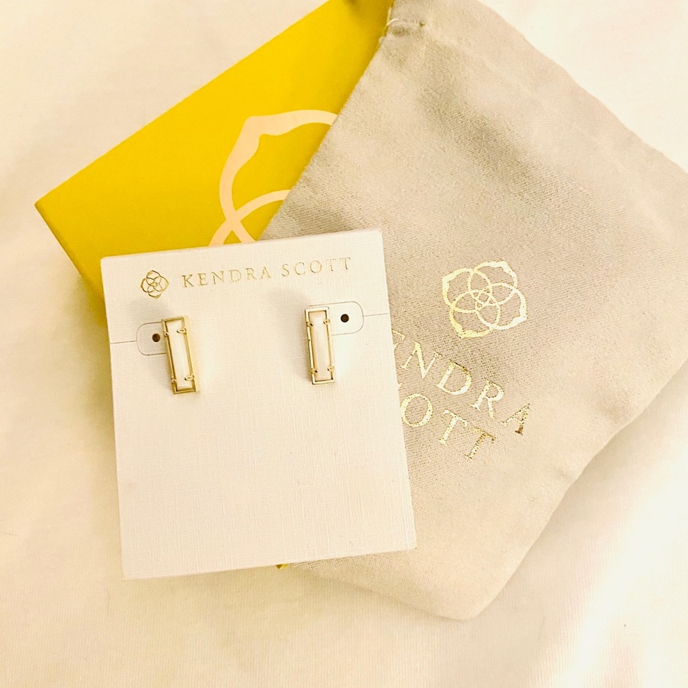 Kendra Scott lady studs, gold and mother of pearl.